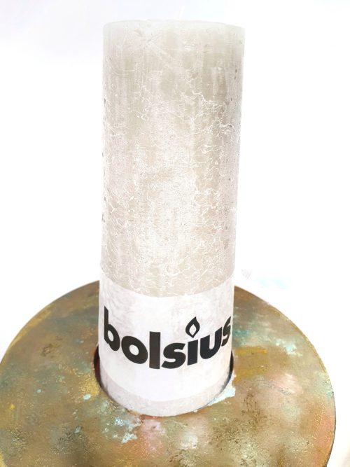 resin pillar candle holder with candle - close up